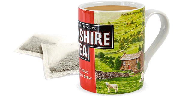 Yorkshire Tea in a mug with a bag on the side